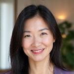 Portrait of Sophia Chen, an attentive, professional woman.